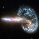 Illustration for article titled The Cosmic Wonder of Colliding Galaxies